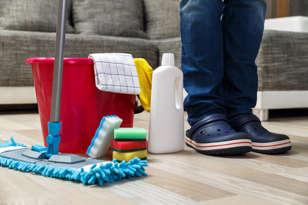 Cleaning Service Bucket With Sponges Chemicals Bottles And Mopping Stick