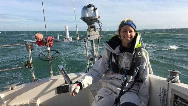 a women is wearing a layer of cloths to protect from chilly weather