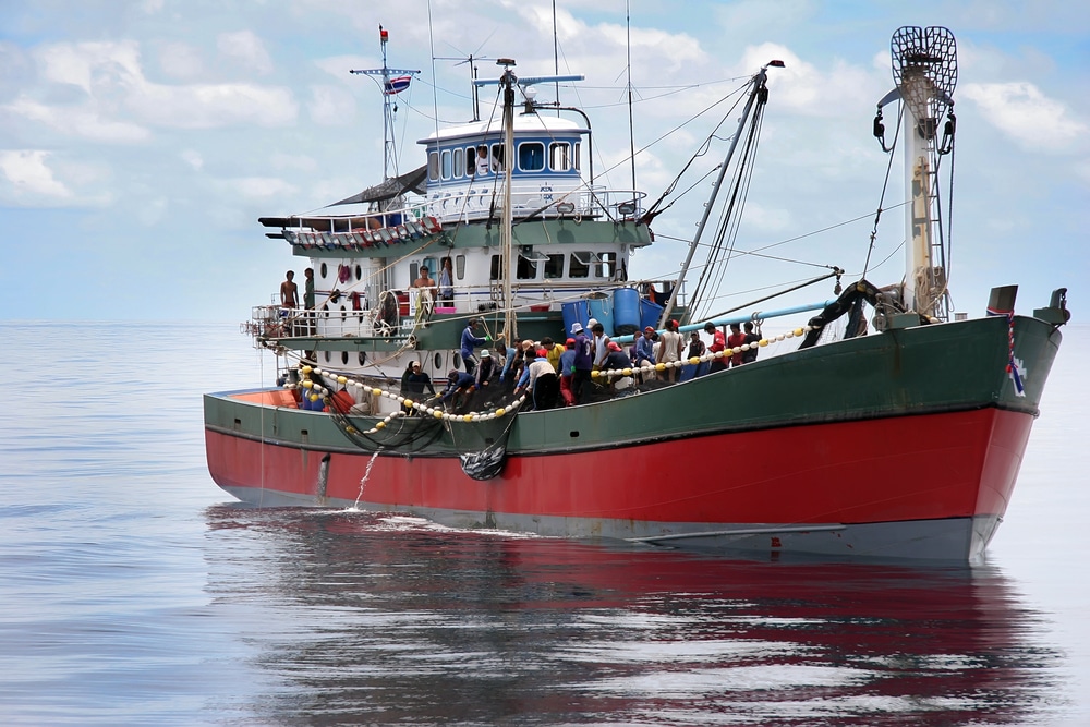 a crabbing boat in the middle of the water