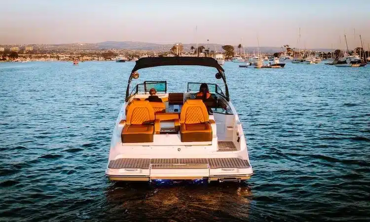 A backview of a boat sailing in the sea