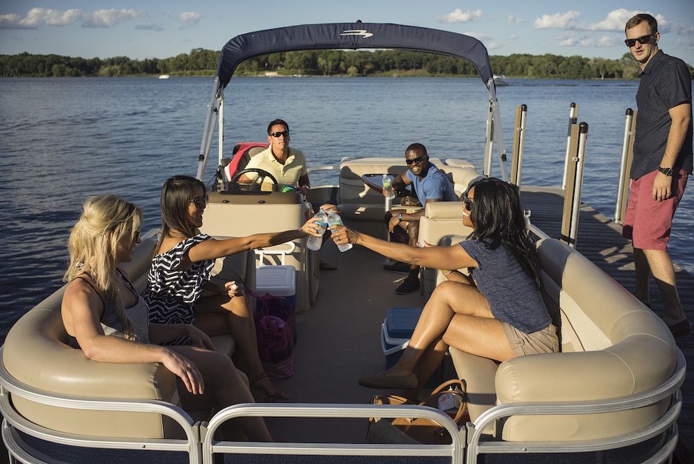 A view of a family cruising inside a boat towards sea