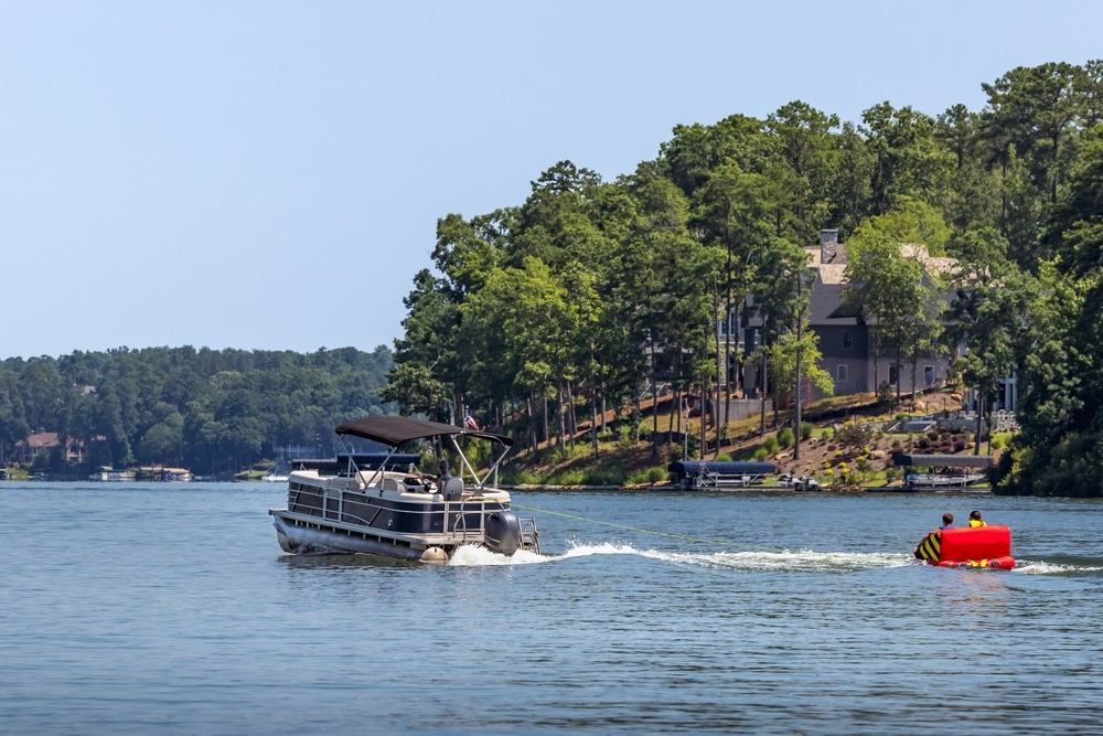 A view of a family pontoon boat in the sea