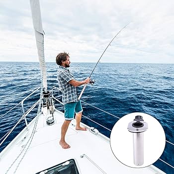 A view of a person standing on aboat deck holding a rod