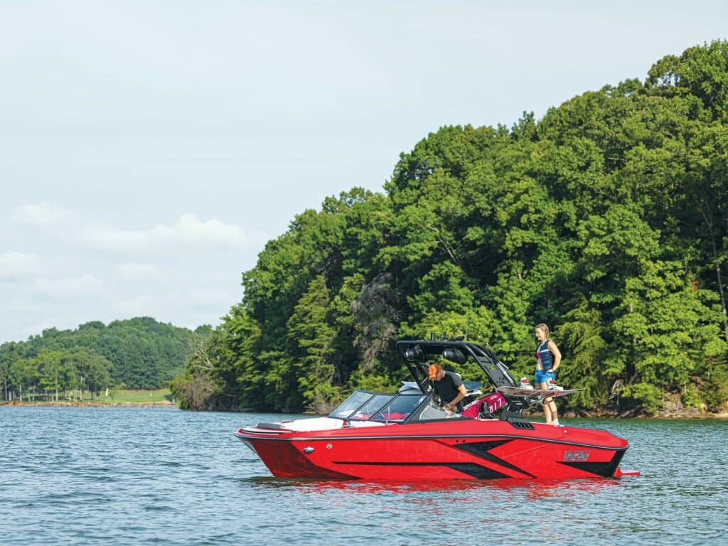 A view of a red ski boat in sea