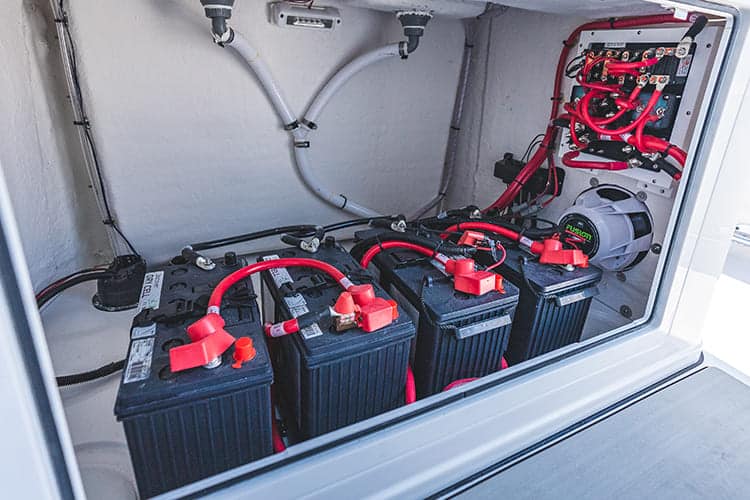 A view of batteries attached inside a boat