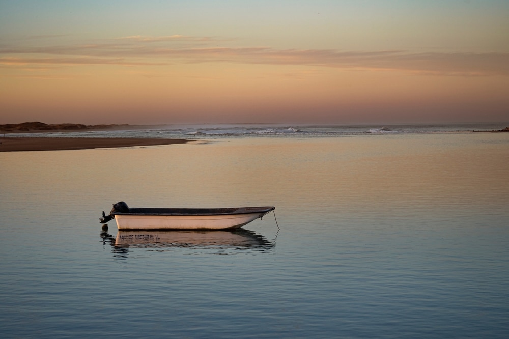 A view of a small boat floating on sea