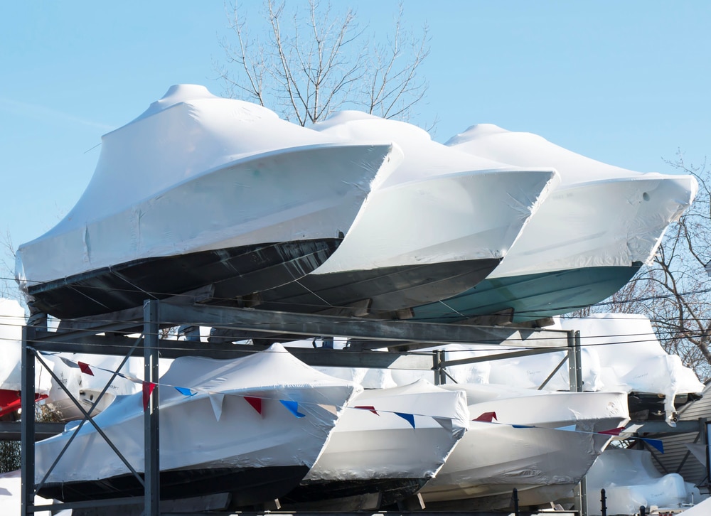 A view of boats winterized during the cold snow