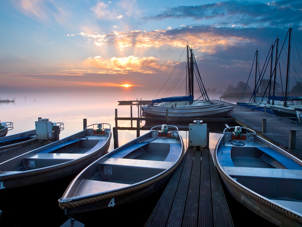 A view of boats at a sea cost sunrise