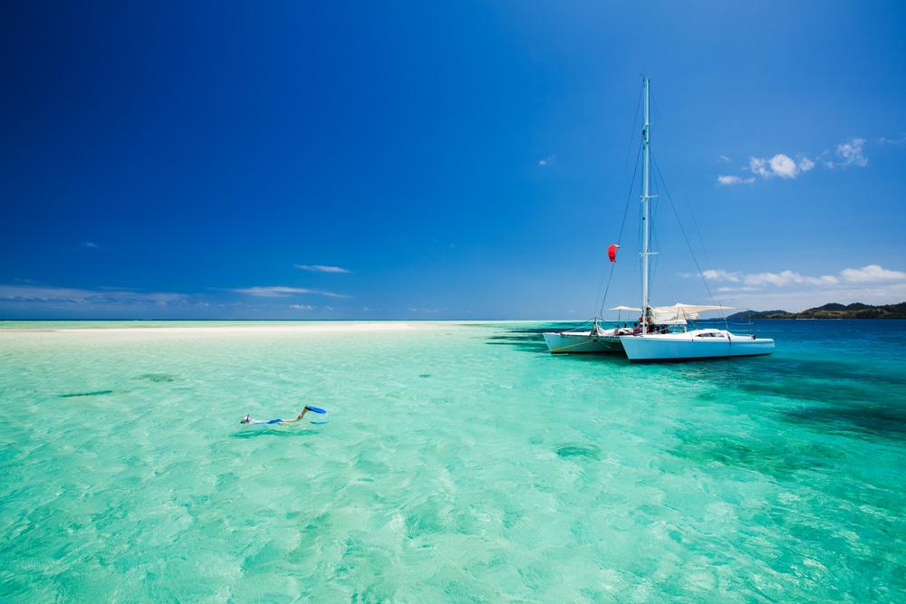 A view of a boat snorkeling in shallow waters